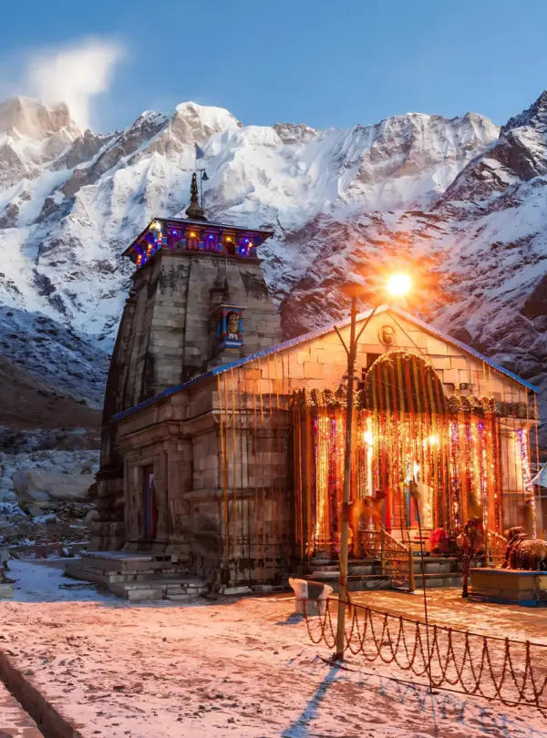 Kedarnath Temple with snow-covered Himalayan peaks during Char Dham Yatra in Uttarakhand